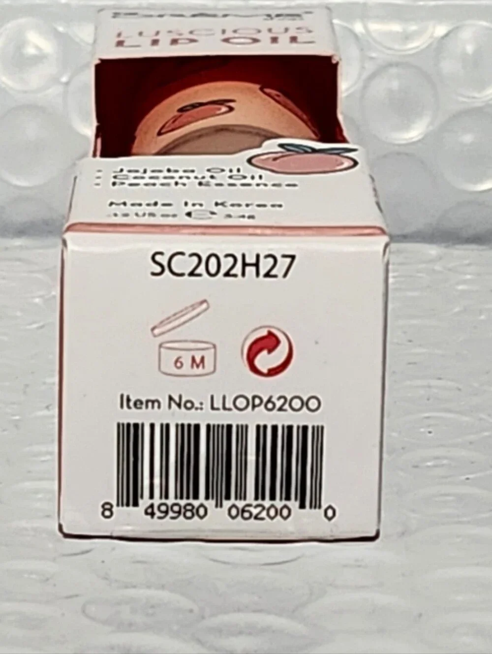 The Creme Shop Lucious Lip Oil in Peach Cobbler